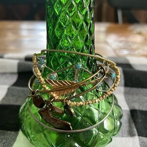 Gold toned constellation California silver toned bracelets